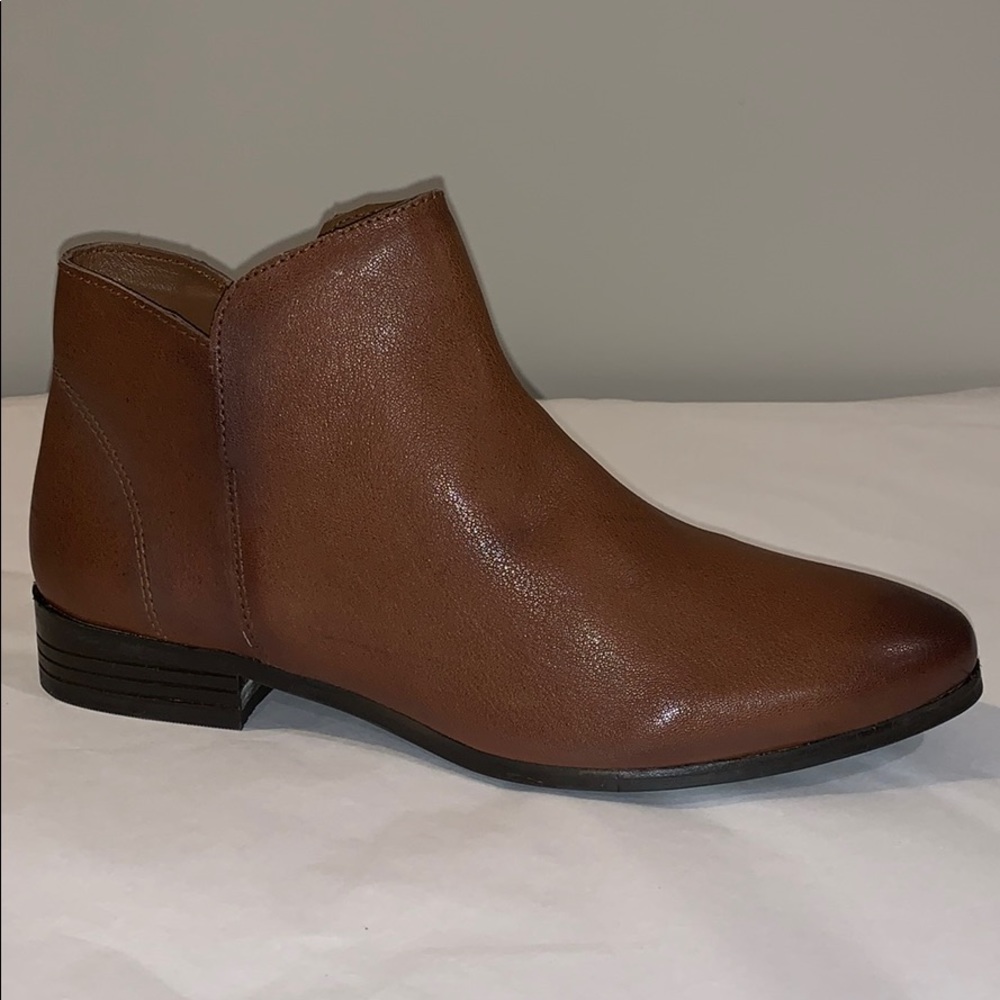 Brown leather booties.